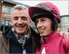  ??  ?? 2017: Owner Michael O’Leary with Bryan Cooper after winning the Ryanair Gold Cup Novice Steeplecha­se with Road To Respect during the Fairyhouse Easter Festival at Fairyhouse