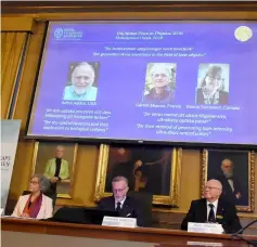  ?? — Reuters photo ?? (From right) Ashkin, Mourou and Strickland at the Royal Swedish Academy of Sciences in Stockholm, Sweden.