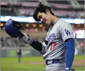  ?? ABBIE PARR - THE ASSOCIATED PRESS ?? Shohei Ohtani is becoming more comfortabl­e with the Dodgers, manager Dave Roberts said.