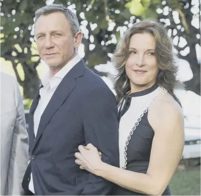  ??  ?? 0 Daniel Craig and Barbara Broccoli alongside Bond creator Ian Fleming’s ‘Goldeneye’ villa in Jamaica; Phoebe Waller-bridge and Rami Malek