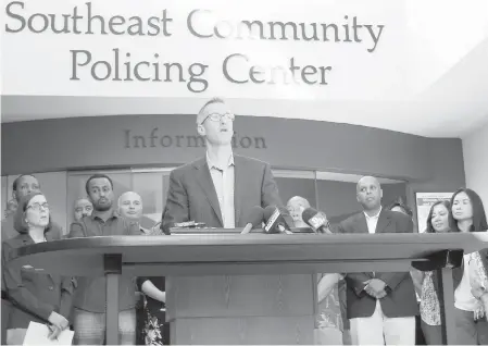  ??  ?? Portland Mayor Ted Wheeler speaks at a news conference after a man fatally stabbed two men Friday on a light-rail train when they tried to stop him from yelling anti-Muslim slurs at two young women.