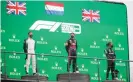  ?? Photograph: DPPI/Antonin Vincent/ LiveMedia/REX/Shuttersto­ck ?? Max Verstappen (centre) on the podium as winner, flanked by the second-placed George Russell (left) and Lewis Hamilton.