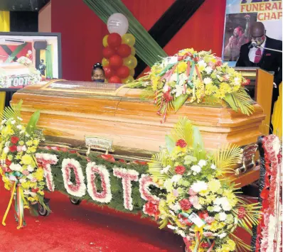  ??  ?? The casket carrying the remains of the late Fredrick ‘Toots’ Hibbert.