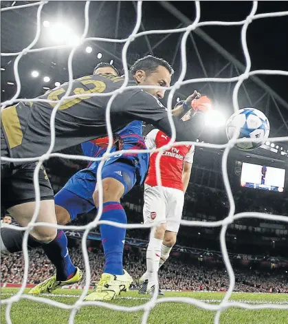  ?? Picture: REUTERS ?? PAINFUL SLIP: Arsenal’s goalkeeper David Ospina scores an own goal and the second goal for Olympiakos in Arsenal’s shock 3-1 home defeat Tuesday. Arsenal will be expected to recall goalkeeper Petr Cech for their match against Manchester United on Sunday