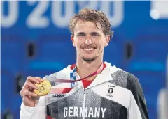  ?? REUTERS ?? Alexander Zverev poses with his Olympic gold medal.