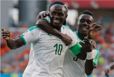  ?? Picture: VADIM GHIRDA, AP ?? ONE FOR THE MANE: Sadio Mane celebrates scoring Senegal’s opening goal with teammates at the Yekaterinb­urg Arena yesterday.