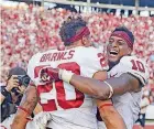  ?? [PHOTO BY IAN MAULE, ?? Oklahoma safety Robert Barnes celebrates the win over Texas with Steven Parker. Barnes’ role figures to expand Saturday against TCU after Will Johnson’s ejection for targeting last week.