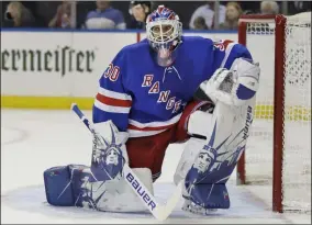  ?? SETH WENIG - THE ASSOCIATED PRESS ?? FILE - New York Rangers’ Henrik Lundqvist reacts after a save during the third period of an NHL hockey game against the Philadelph­ia Flyers in New York, in this Sunday, March 1, 2020, file photo.