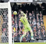  ?? REUTERS ?? Manchester United’s David de Gea allows a tame shot by Watford’s Ismaila Sarr to slip through his hands.