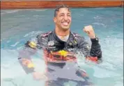  ?? AP ?? Daniel Ricciardo celebrates in a pool after winning Monaco GP.