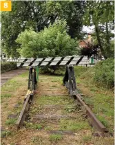  ??  ?? 8. A buffer stop marks the end of the Longmoor Military Railway at Liss. The National Rail station is to the left. 8