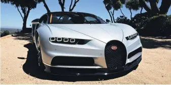  ?? NICHOLAS DELLA CAVA FOR USA TODAY ?? This may be your best chance to examine the 1,500- horsepower Bugatti Chiron, which otherwise can blow by you at up to 261 mph.