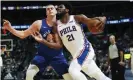  ??  ?? Joel Embiid and Nikola Jokić have ushered in a new era for centers. Photograph: David Zalubowski/AP