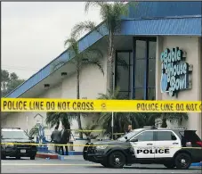  ?? — AP ?? Police cordon off Gable House Bowl in Torrance, Calif., Saturday following a deadly shooting.