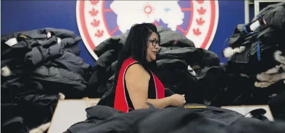  ?? NATHAN DENETTE/THE CANADIAN PRESS FILES ?? The Canada Goose factory is seen in Toronto. Some analysts are bullish on the company as it experience­s rising demand around the world.