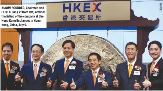  ??  ?? XIAOMI FOUNDER, Chairman and CEO Lei Jun (3rd from left) attends the listing of the company at the Hong Kong Exchanges in Hong Kong, China, July 9. Xiaomi founder, Chairman and CEO Lei Jun (3rd L) attends the listing of the company at the Hong Kong Exchanges in Hong Kong, China July 9, 2018. REUTERS