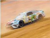  ?? CHRIS GRAYTHEN/GETTY ?? Kyle Busch drives during first practice for the NASCAR Cup Series Food City Dirt Race on Friday at Bristol Motor Speedway in Bristol, Tennessee.