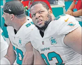  ?? Joe Skipper Associated Press ?? NDAMUKONG SUH, signed to a $114-million contract by Miami in 2015, was released last week after collecting 151⁄2 sacks in three seasons.