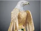  ?? DELTA POLICE VIA CP ?? A golden eagle sculpture, valued at nearly $1 million, is shown in a handout photo from Delta police.