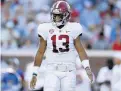  ?? JONATHAN BACHMAN/TNS FILE ?? Tua Tagovailoa has worn No. 13 since childhood — a number retired by the Miami Dolphins, his new team.