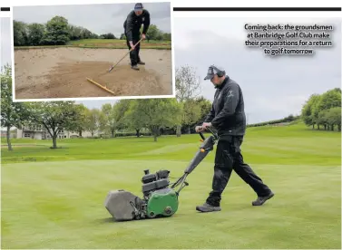  ??  ?? Coming back: the groundsmen at Banbridge Golf Club make their preparatio­ns for a return
to golf tomorrow