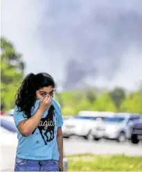  ?? Karen Warren / Staff file photo ?? When the KMCO fire broke out in Crosby in April, the state and county rushed to file legal action as the blaze burned.