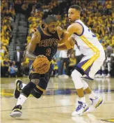  ?? Michael Macor / The Chronicle 2016 ?? Cleveland guard Kyrie Irving, driving past the Warriors’ Stephen Curry in Game 1 of last year’s Finals, creates space for his outside shot with his quick forays to the basket.