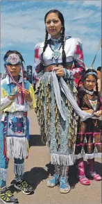  ?? ERIC MCCARTHY/JOURNAL PIONEER ?? Jingle dancer Kelly Sark and her children, Jakoby (left) and Shanaya Wells were dressed for a celebratio­n during National Aboriginal Day on Lennox Island Wednesday.