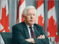  ?? CP PHOTO SEAN KILPATRICK ?? Bob Rae listens at a press conference regarding his appointmen­t as the next Ambassador to the United Nations in this July file photo.
