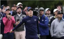  ?? Brookline. Photograph: Charlie Riedel/AP ?? England’s Matt Fitzpatric­k watches a shot on the 18th hole during his third round at