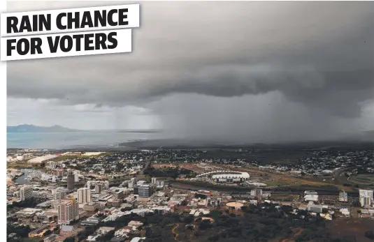  ?? ?? A small rainstorm passes over Townsville on Thursday afternoon. Picture: Evan Morgan