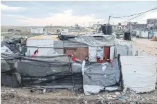  ??  ?? TAKE SHELTER: Makeshift homes in Beit-Hanoun in northern Gaza. The strip is drifting further away from West Bank Palestinia­ns.