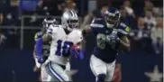  ?? RON JENKINS - THE ASSOCIATED PRESS ?? Cowboys’ Tavon Austin returns a punt as Seahawks’ Ed Dickson chases in a wild-card game in Texas on Jan. 5.