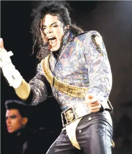  ?? (Wikimedia Commons) ?? THE WRITER and Michael Jackson (seen here performing in 1992): Something in common.