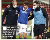  ??  ?? BRIGHTON ROCKED: Solly March hobbles off at Anfield