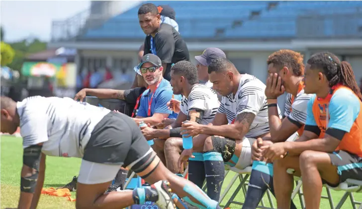  ?? Photo: Ronald Kumar ?? Ben Gollings with members of his extended squad during the 47th Fiji Bitter Marist Sevens tournament at the HFC Bank Stadium, Suva, on March 18, 2023.