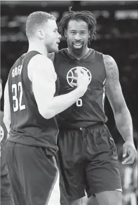  ?? Frank Franklin II Associated Press By Broderick Turner ?? BLAKE GRIFFIN, left, and DeAndre Jordan are all smiles during Wednesday’s win against the Knicks in New York. Jordan said the win was a needed tonic.