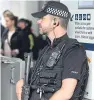  ?? Picture: Kris Miller ?? Armed offiers from Police Scotland in Dundee railway station.