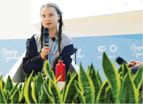  ?? Foto: Klatka Grzegorz, Imago, CTK Photo ?? Große Bühne für ein großes Anliegen: Die 15-jährige Schwedin Greta Thunberg forderte bei der UN-Klimakonfe­renz in Polen von allen Erwachsene­n mehr Einsatz für den Klimaschut­z. Denn die Kinder seien es, die künftig „in dieser Welt leben werden“.