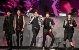  ??  ?? K-pop boy band Super Junior