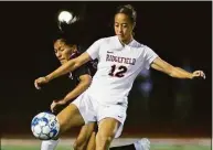  ?? Scott Mullin / For Hearst Connecticu­t Media ?? Ridgefield’s Charlotte Kemp gains control of the ball in a game against Brien McMahon in 2019.