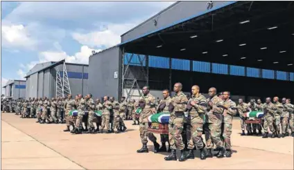  ??  ?? Let down: Like the South African troops killed in the Central African Republic in 2013 (above), the country’s peacekeepe­rs in the Democratic Republic of the Congo (left) are underequip­ped. Photos: Reuters & James Akena/Reuters