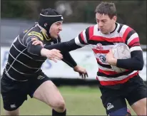  ??  ?? Enniscorth­y’s Richard Dunne evades a tackle from Kilkenny’s Hugh Lane during their league-winning game on Saturday.