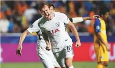  ?? AP ?? Tottenham’s Harry Kane celebrates his second goal during the Champions League match against APOEL Nicosia.