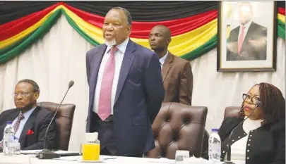  ?? — (Picture by Dennis Mudzamiri) ?? Chairman of the Commission of Inquiry into the 2018 post-election violence, former South African president Kgalema Motlanthe (centre) addresses people during the commission's public hearing on the violence at a Bulawayo hotel yesterday. He is flanked by commission­ers Professor Charity Manyeruke from the University of Zimbabwe (on his left) and Nigeria’s Chief Emeka Anyaoku.