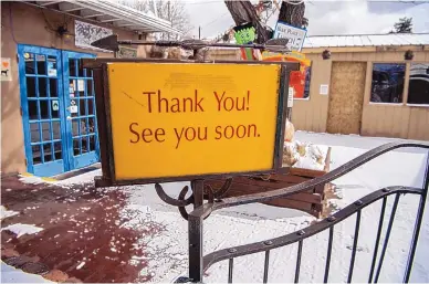  ?? EDDIE MOORE/JOURNAL ?? The Cowgirl restaurant in Santa Fe has closed as a result of health orders, and its website indicates it plans to reopen in March. Indoor dining is still prohibited in most New Mexico counties.