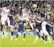  ?? BERNAT ARMANGUE AP ?? Rodrygo scores Real Madrid’s second goal during the Champions League semifinal vs. Manchester City.