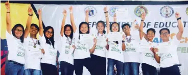  ??  ?? The Graders campus journalist­s and advisers celebrate after defending their championsh­ip title in Collaborat­ive Desktop Publishing (English) at the 2018 NSPC in Dumaguete City.