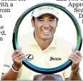  ?? REUTERS ?? Get in the hole: Matsuyama with his trophy