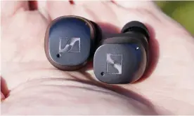  ?? ?? Sennheiser’s latest Momentum Bluetooth earbuds last a long time, fit really well and sound brilliant with effective noise cancelling. Photograph: Samuel Gibbs/The Guardian